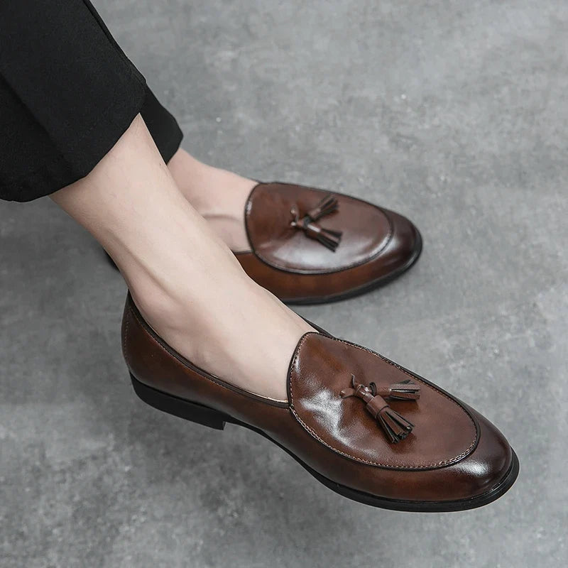 High-shine men's formal tassel loafers, easy slip-on style in classic brown leather.