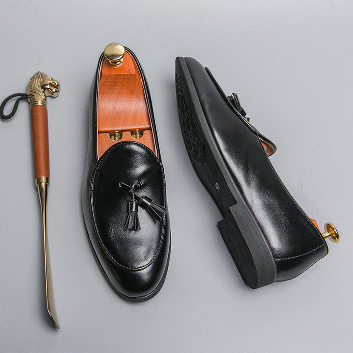 Classic brown men's tassel loafers, providing ultimate slip-on comfort for formal and everyday wear.