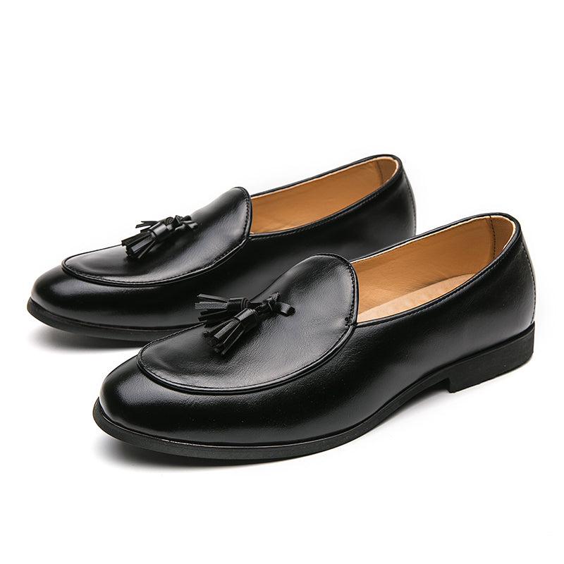 Premium men's polished brown tassel loafers, designed for slip-on ease and refined formal fashion.