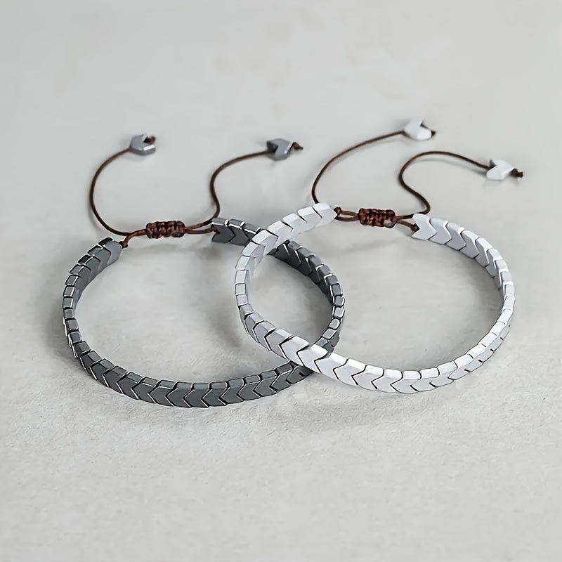 Versatile polished hematite beaded bracelet, unisex natural stone accessory. Adjustable & perfect for layering.