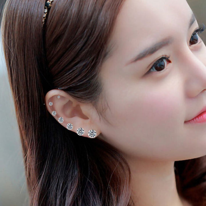Polished stainless steel stud earrings for women with sensitive skin, hypoallergenic & minimalist design for everyday wear.