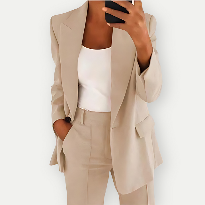 Polished women's blazer suit set, perfect for office attire & professional wear. Chic tailored two-piece outfit.