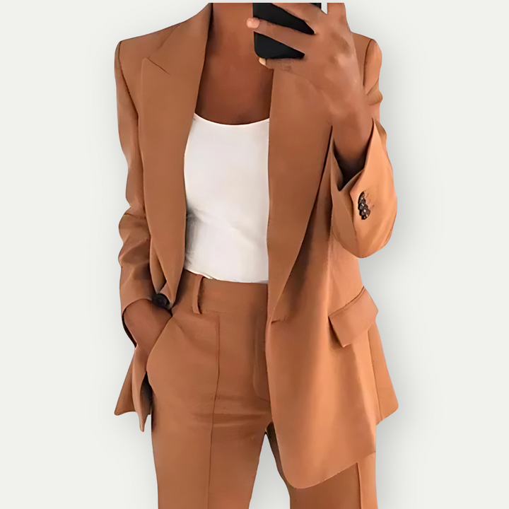 Fashionable women's two-piece blazer suit. Versatile professional clothing for work & business events.