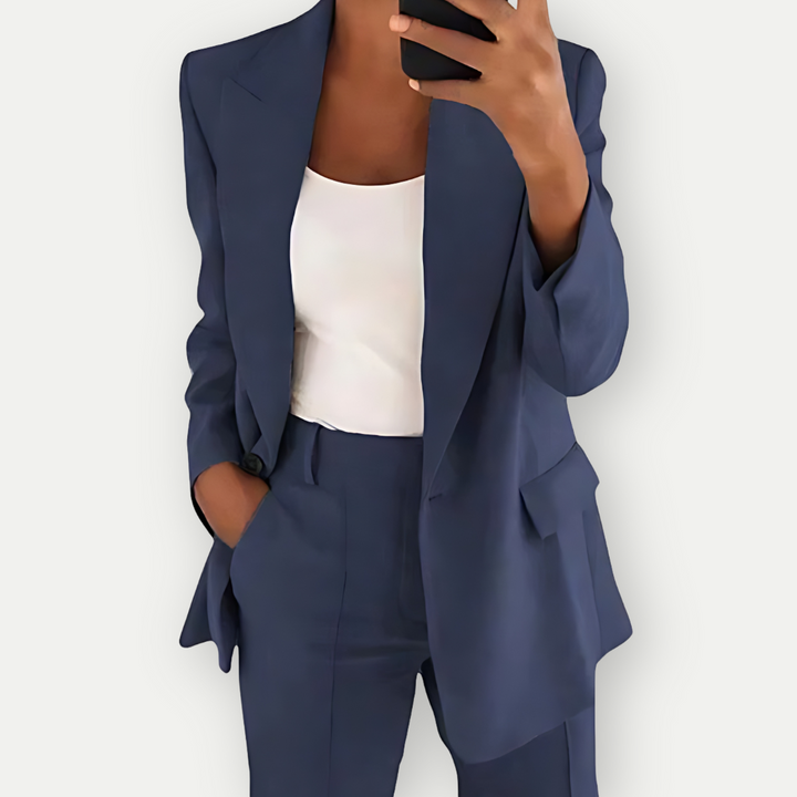 Polished women's blazer and pant suit set, ideal formal wear for professional settings and office fashion.