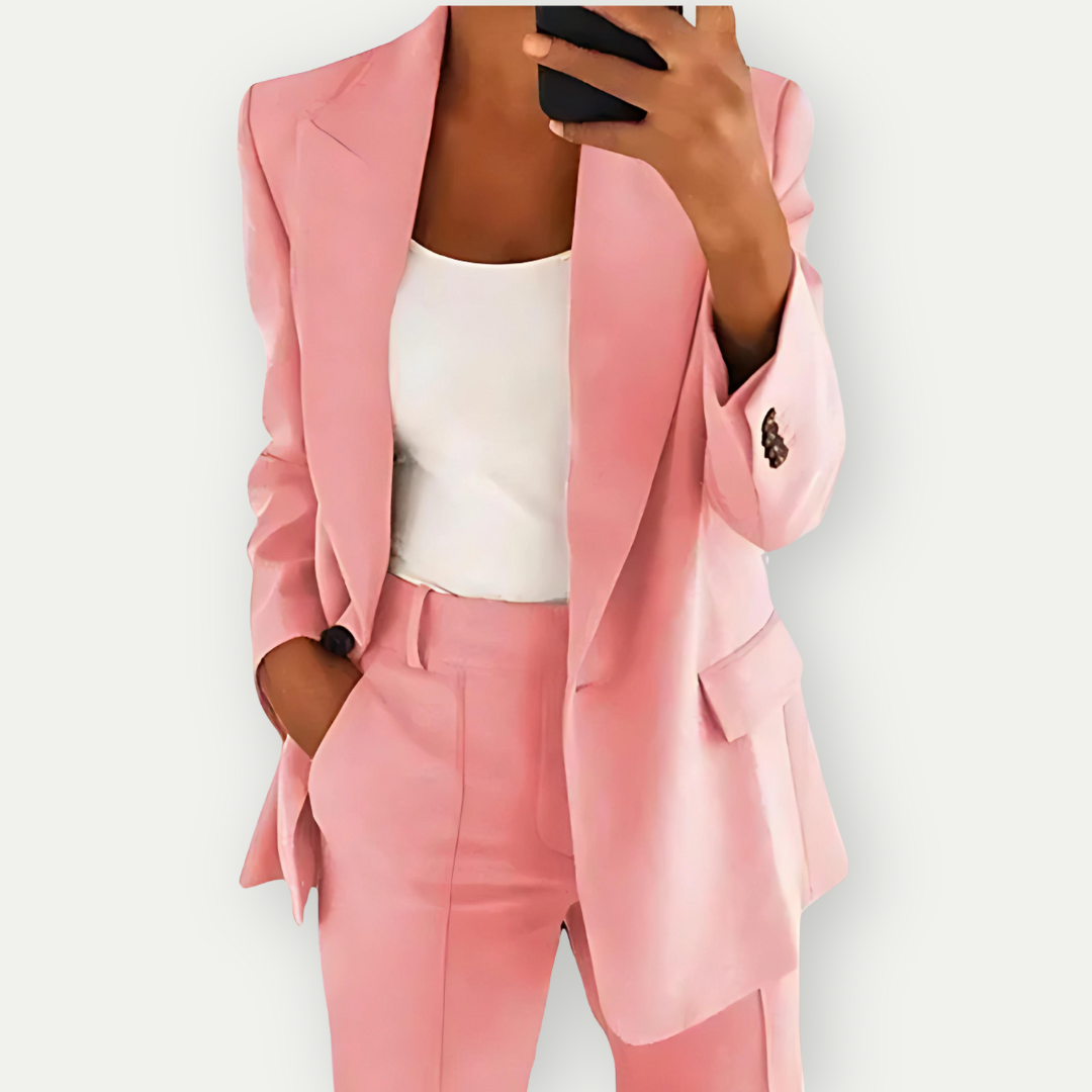 Modern women's chic blazer suit set. A professional two-piece outfit perfect for sophisticated office attire.