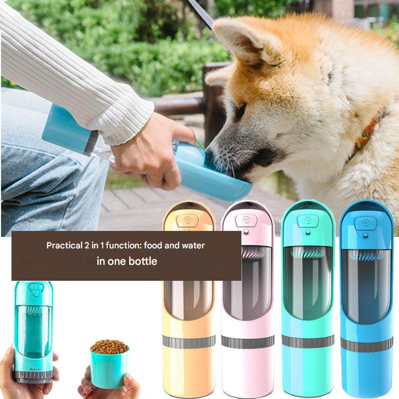 Dog drinking from the portable water dispenser part of the 2-in-1 travel bottle.