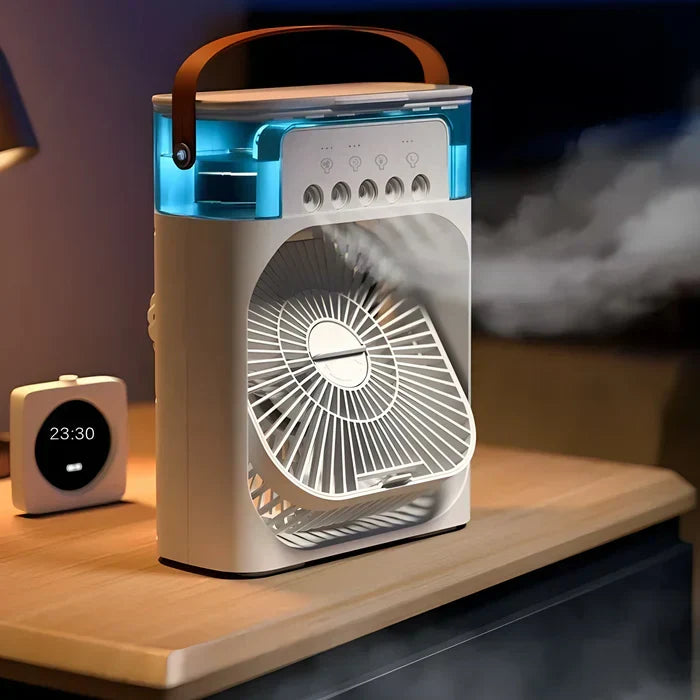 Efficient 3-in-1 fan, air cooler, and humidifier. This portable mini AC features colorful LED lights & USB power.