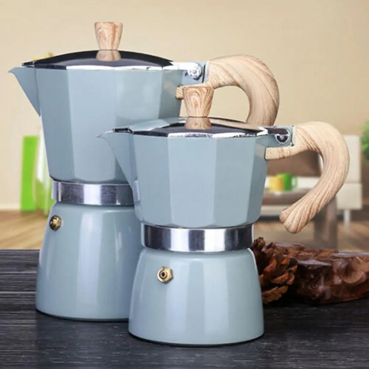 Portable aluminum espresso percolator for authentic Italian coffee, stovetop brewing.