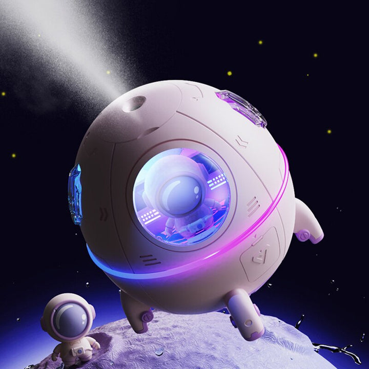 White portable astronaut humidifier & aroma diffuser with soft LED night light. USB rechargeable, space theme decor.