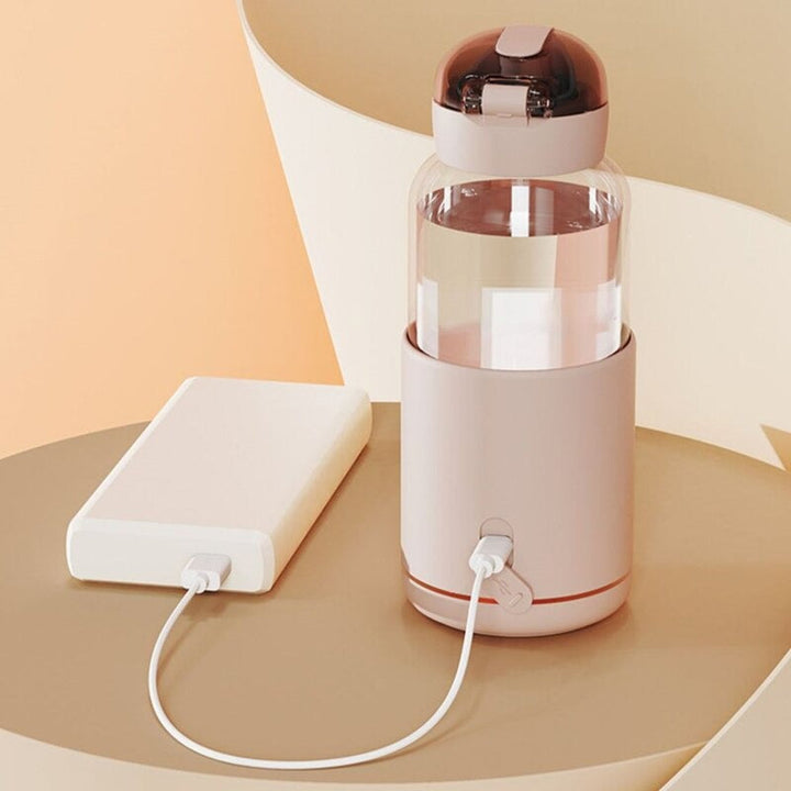 Infant feeding made easy with this portable bottle warmer. USB rechargeable, ideal for travel, road trips & daily use.