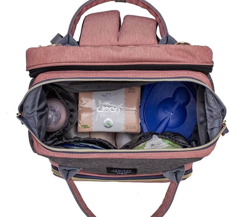 Diaper bag backpack with integrated portable changing bed, a must-have for baby travel and outings.