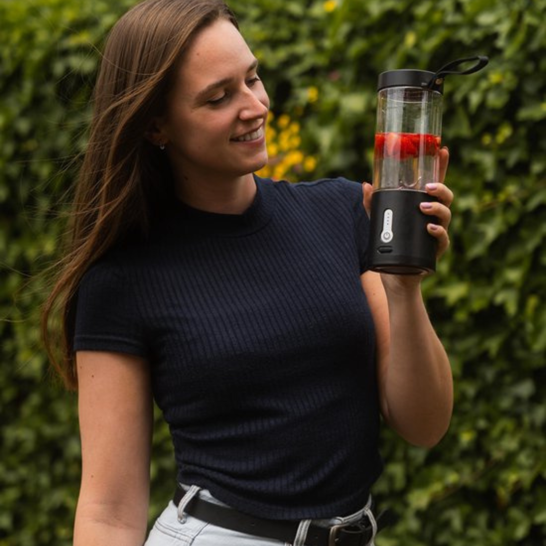 Portable blender with 6 powerful blades for smooth shakes & smoothies on-the-go.