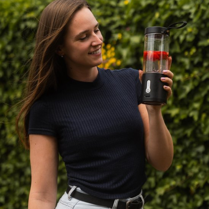 Portable blender with 6 powerful blades for smooth shakes & smoothies on-the-go.