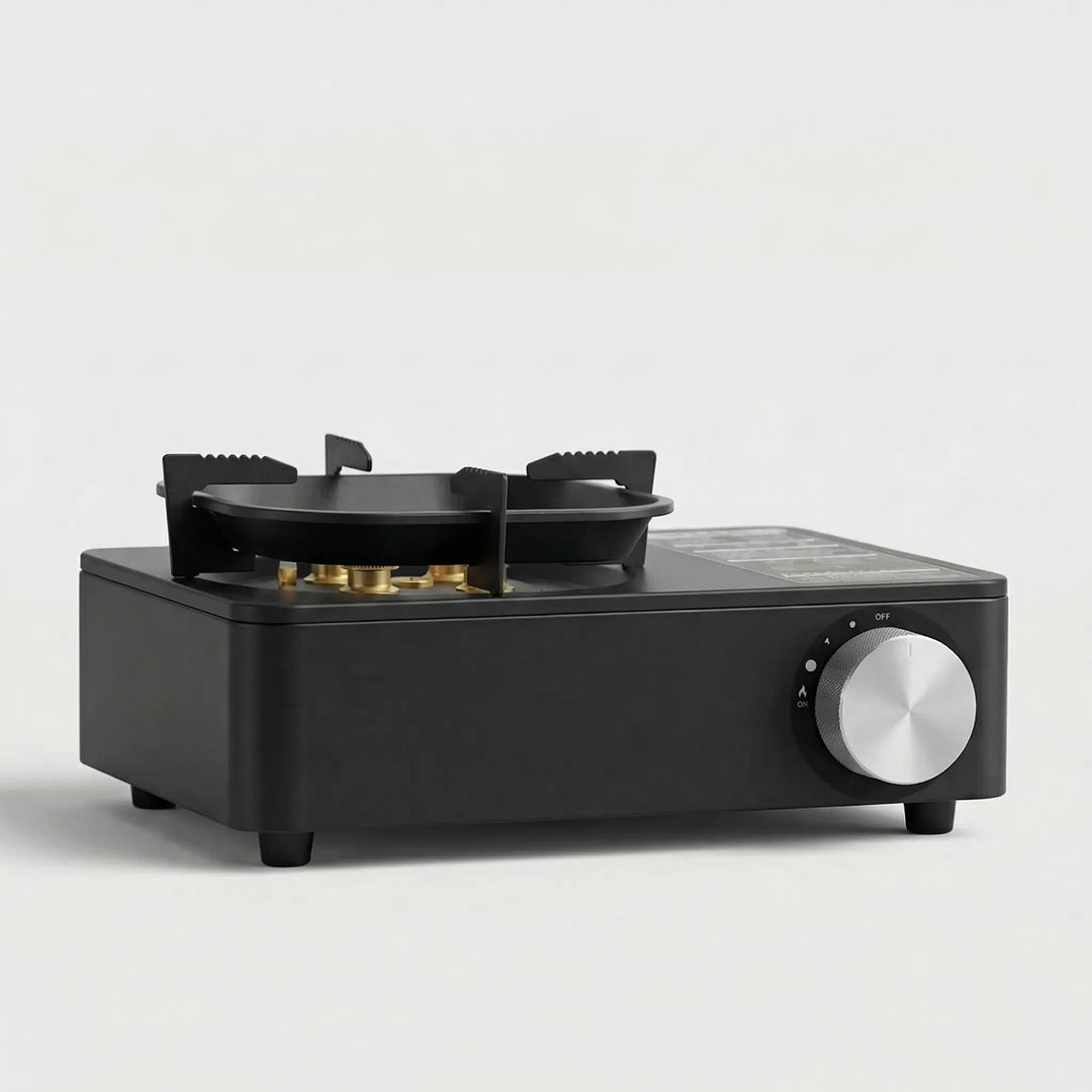 Compact portable butane burner camping stove, ideal for outdoor cooking, backpacking, and travel cooktop.
