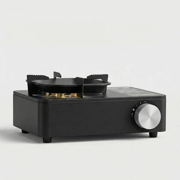 Compact portable butane burner camping stove, ideal for outdoor cooking, backpacking, and travel cooktop.