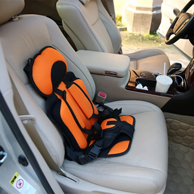 Kids' car seat, foldable & compact, perfect for family adventures and holidays.