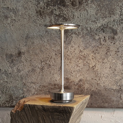 Versatile cordless LED table lamp, portable with adjustable brightness. Ideal for modern home & desk decor.