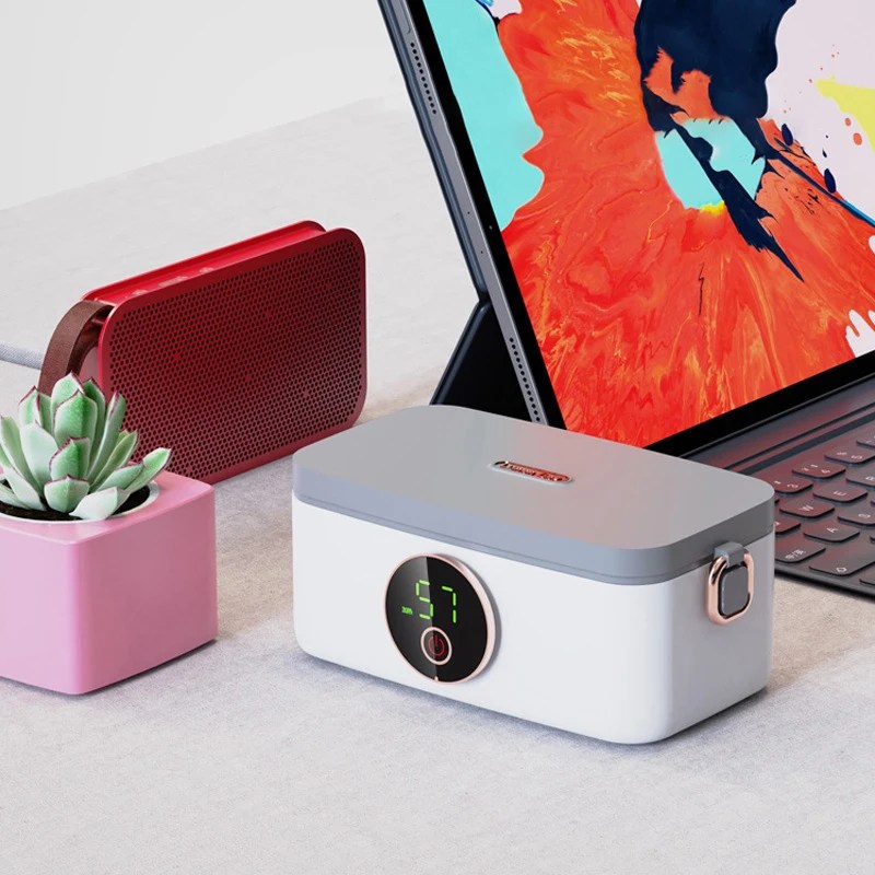 Electric meal prep warmer, ideal for on-the-go warm meals. Stainless steel & portable design.