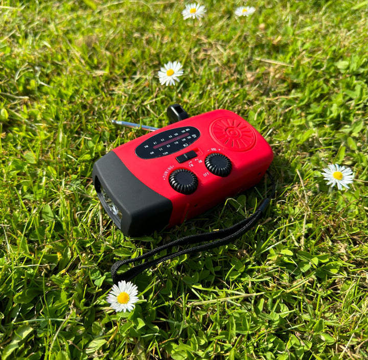 RescueReady portable weather radio for emergencies, camping & survival. Solar/hand crank powered, power bank.