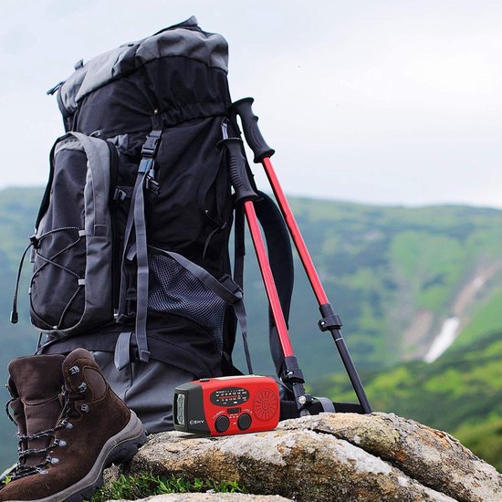 Hand crank & solar powered emergency weather radio with power bank and flashlight for outdoor survival.