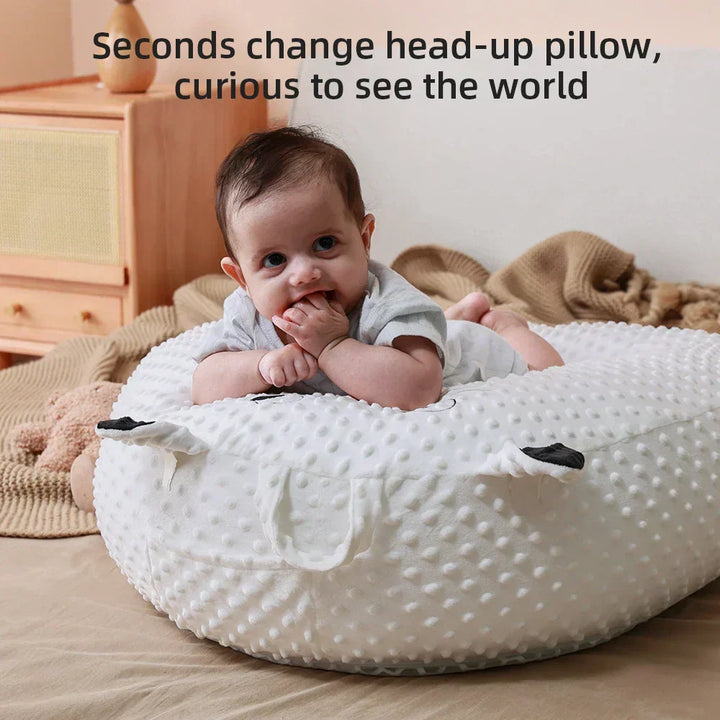 Maternity feeding pillow for comfortable baby nursing, offering ergonomic support for both infant and mother.