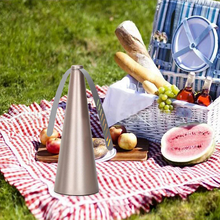 Compact fly repeller fan for outdoor use, essential pest control for any meal or gathering.