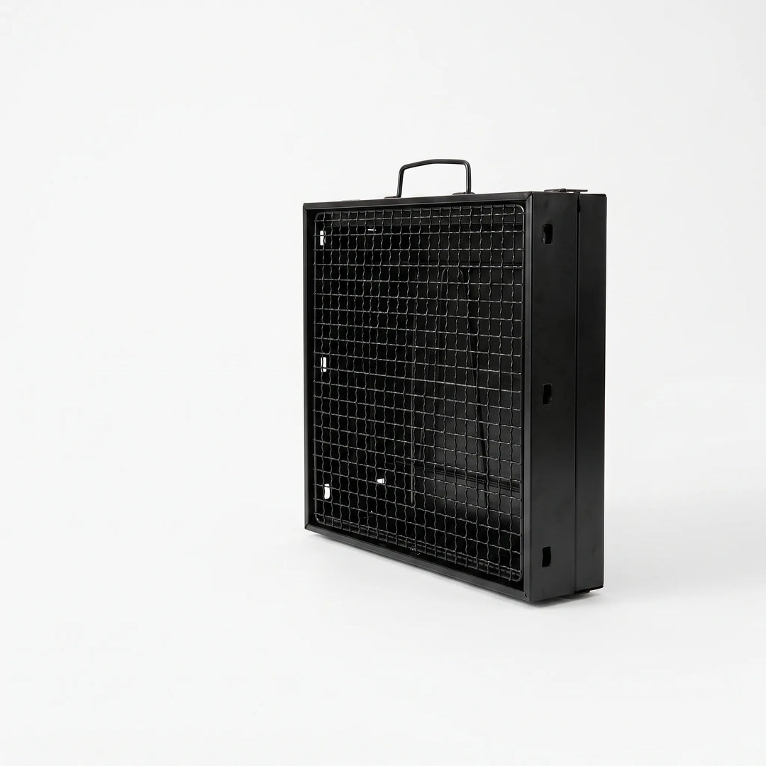 Outdoor portable charcoal grill cooking juicy BBQ. Perfect for camping, picnics, and backyard grilling.