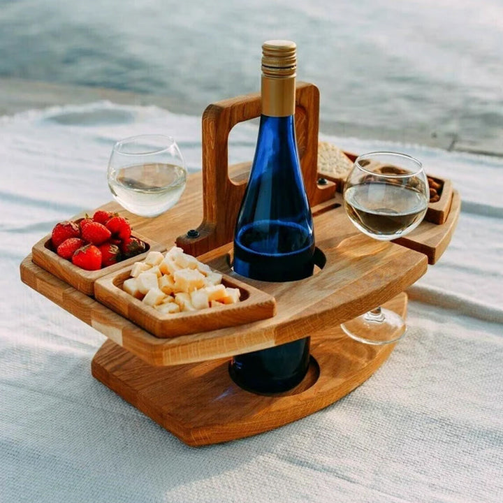 Portable folding picnic wine table for outdoor dining and garden parties.