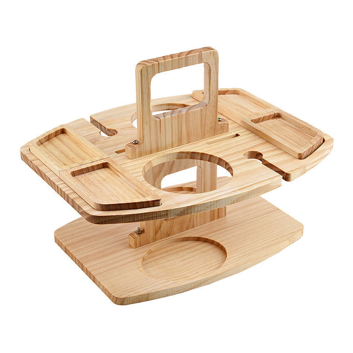 Compact folding wine table, ideal for outdoor picnics, holding glasses & snacks.