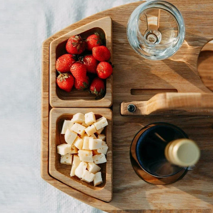Versatile portable folding table for wine, snacks, and comfortable outdoor enjoyment.