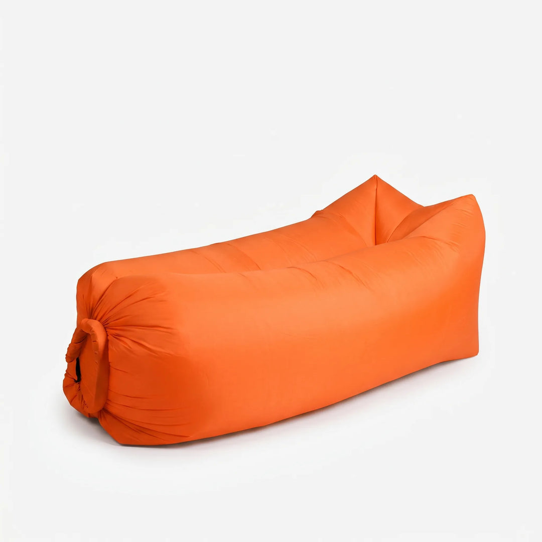Unisex inflatable air sofa for outdoor seating, ideal for beach, garden, and park relaxation. Easy carry.