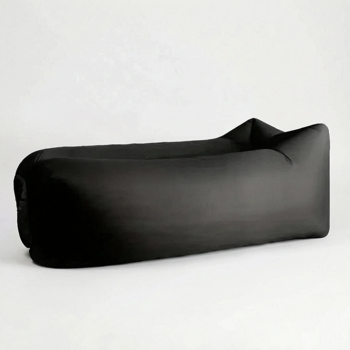 No-pump inflatable air lounger, portable outdoor seating for camping, beach, and garden. Summer essential.