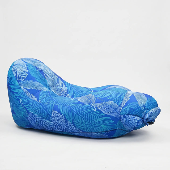 Durable inflatable outdoor lounge chair. Lightweight portable seating for ultimate relaxation at the beach or park.