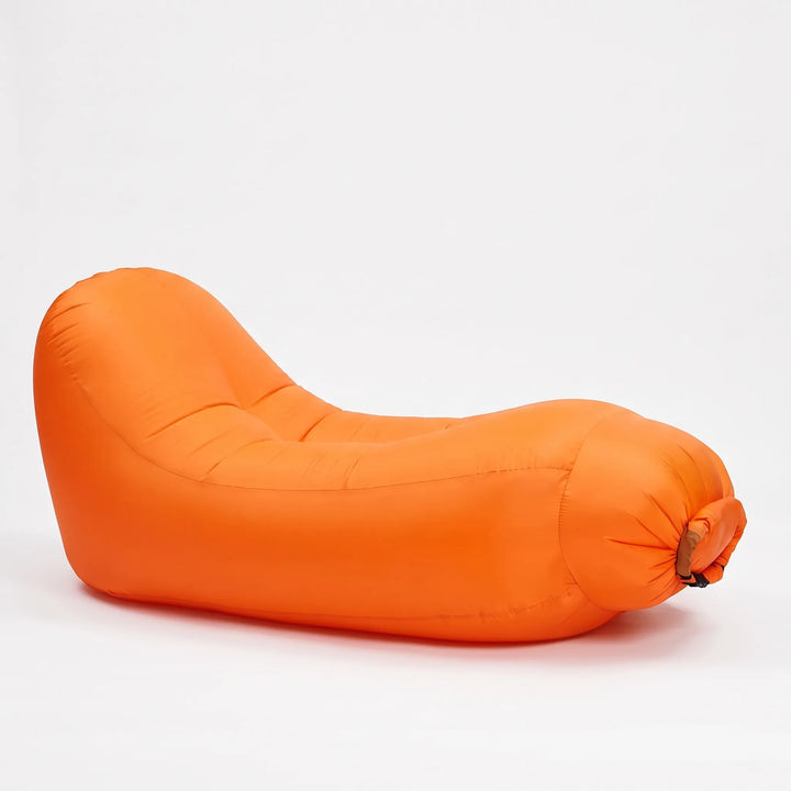 Relax in nature with this portable inflatable camping chair. Great outdoor seating for picnics, hiking, or travel.