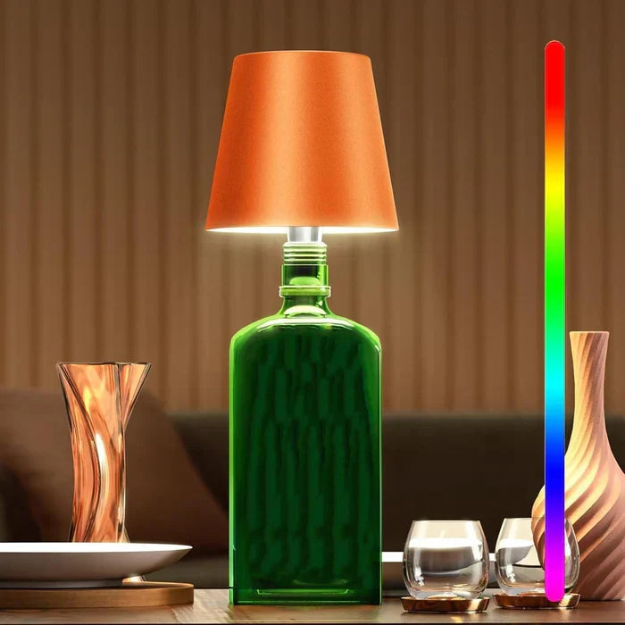 Wireless LED mood lamp in a bottle design, dimmable with touch control.