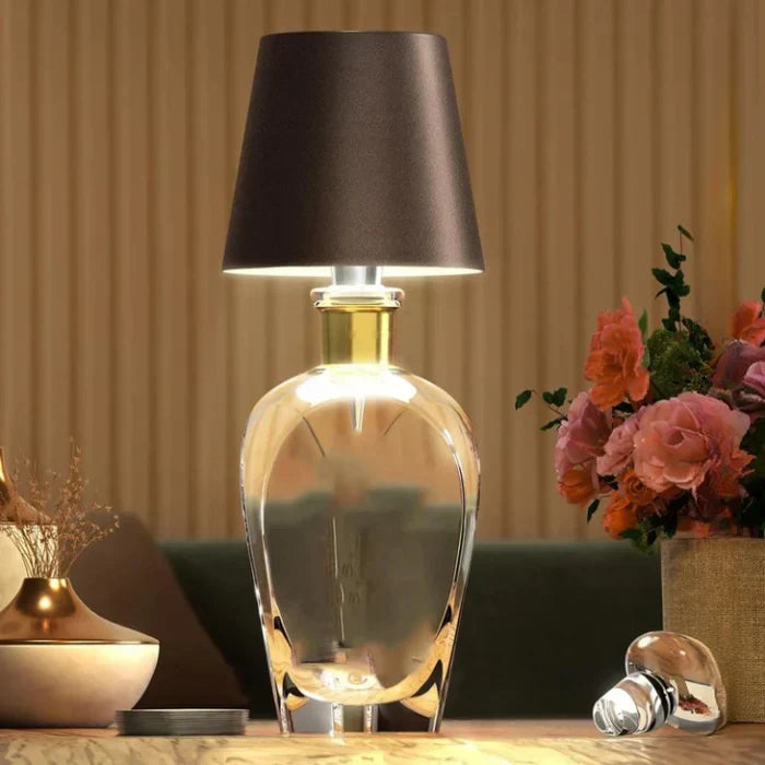 Wireless rechargeable bottle lamp, perfect for mood lighting on a patio or bedside.