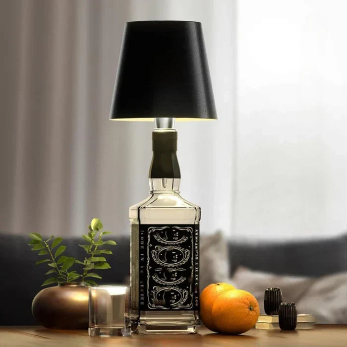 Modern portable LED bottle lamp, wireless and dimmable for versatile lighting.