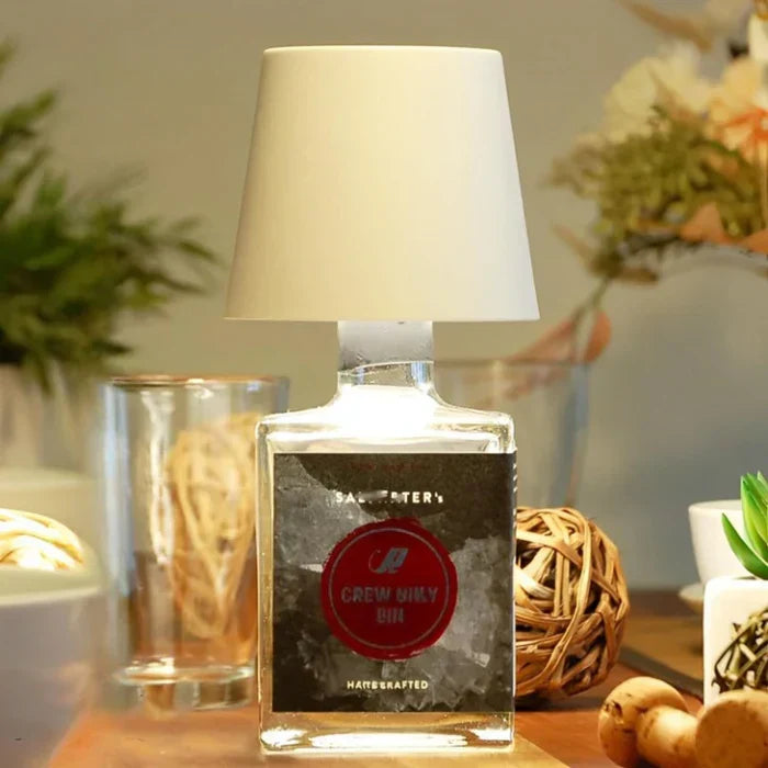 Wireless GlowBottle LED lamp, dimmable and portable for ambient home lighting.