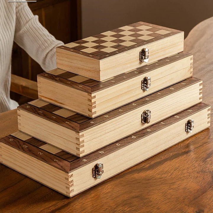 Foldable wooden magnetic chess set packed for travel, with all pieces neatly stored inside the portable board.