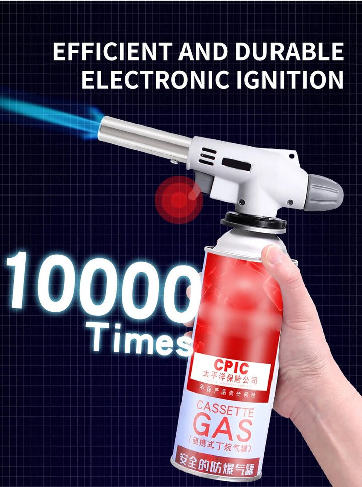 Portable metal butane torch in action, creating a powerful flame for outdoor and kitchen use