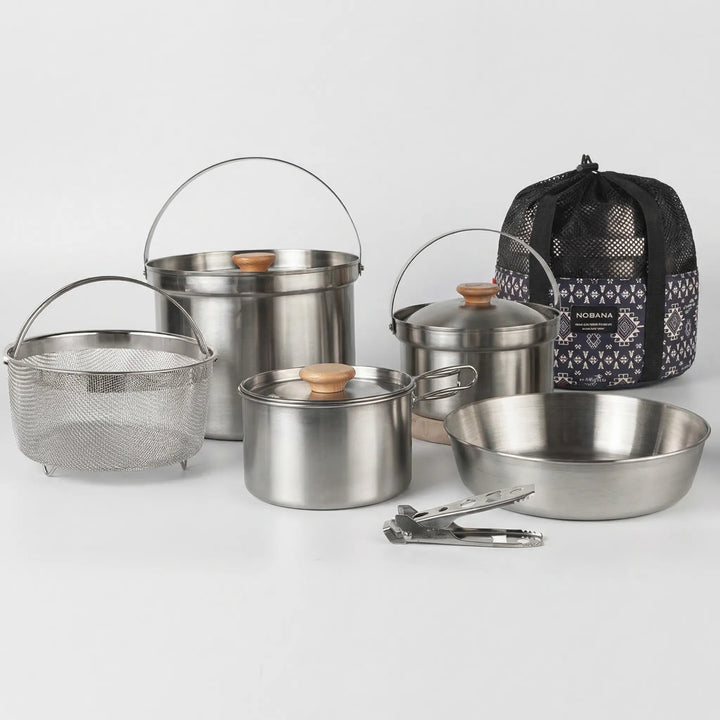 Multi-piece family outdoor cookware set, essential for camping, picnics, and versatile travel kitchen.