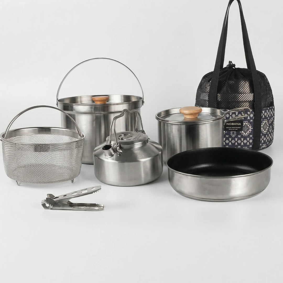 Complete portable stainless steel pot set for family camping, perfect for any outdoor kitchen.