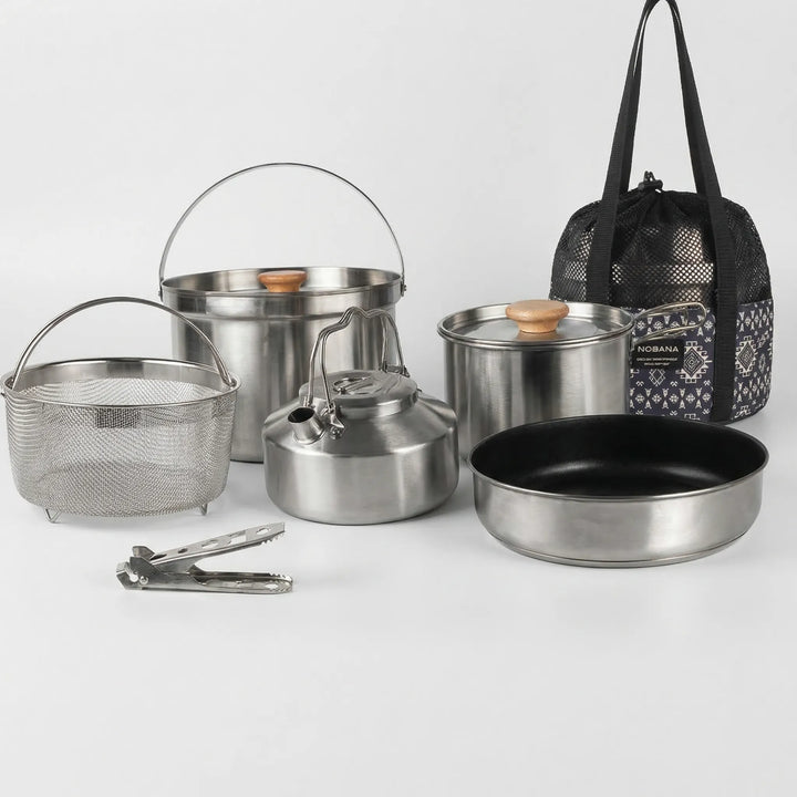 Complete portable stainless steel pot set for family camping, perfect for any outdoor kitchen.