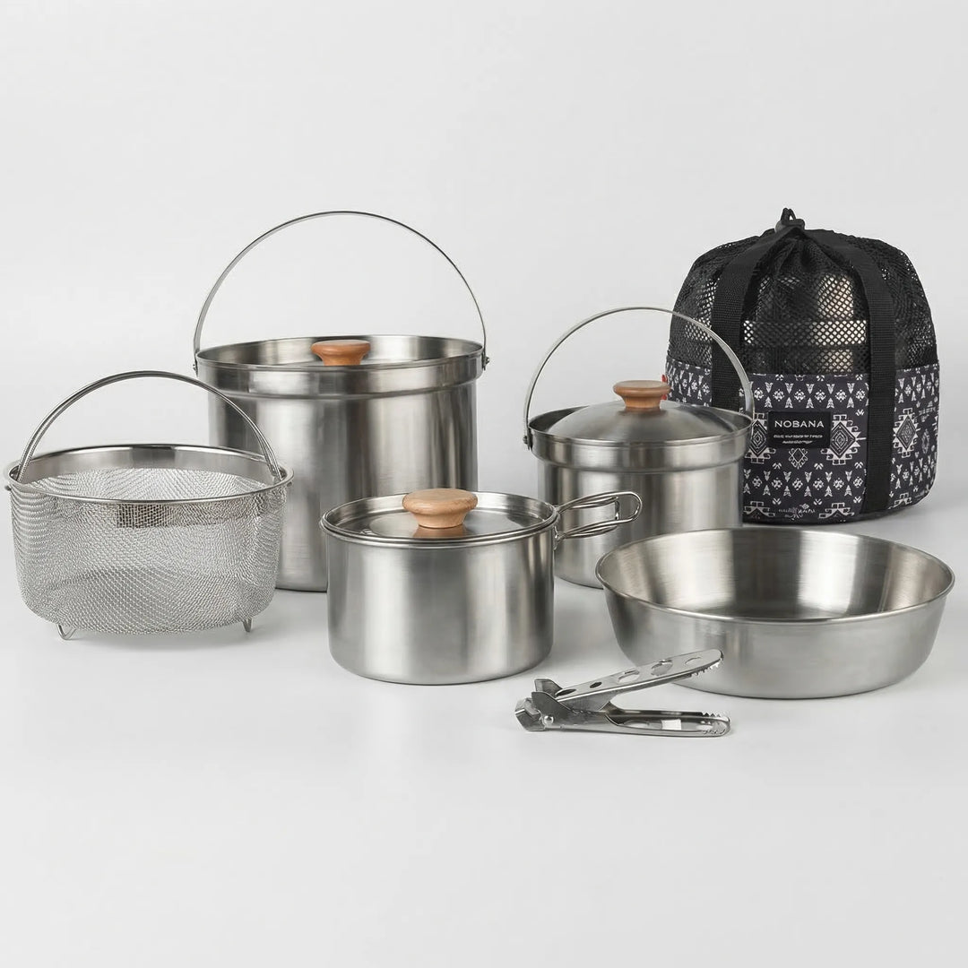 Convenient multi-piece portable cookware set for family camping, picnics, and outdoor travel cooking.