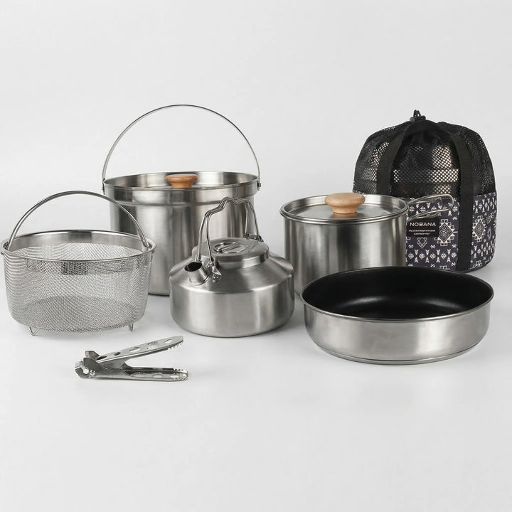 Essential stainless steel multi-piece camping cookware kit for family outdoor cooking & travel.