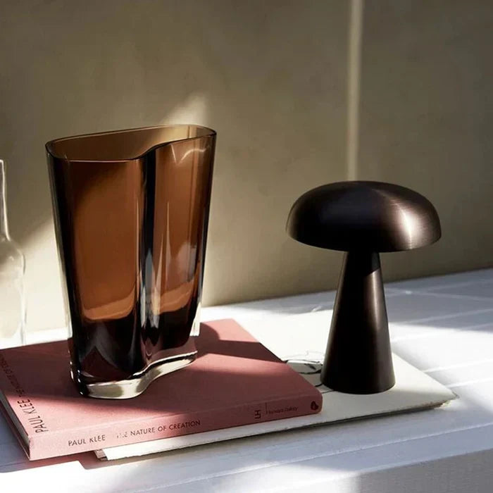 Rechargeable cordless ShroomLite mushroom table lamp, stylish ambient lighting.