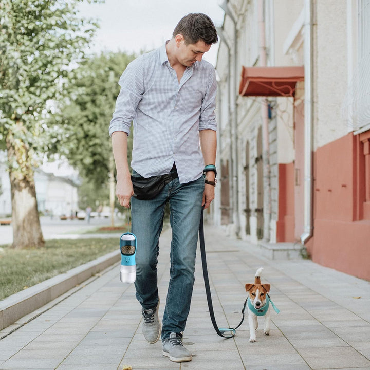 Multi-functional pet travel bottle, dispensing both water and dog food.