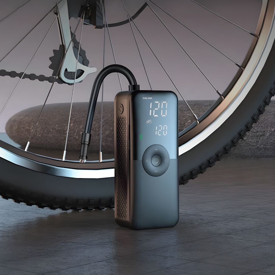 Portable smart tire inflator pump for bikes & sports gear, features digital display & USB-C. Fast & compact.