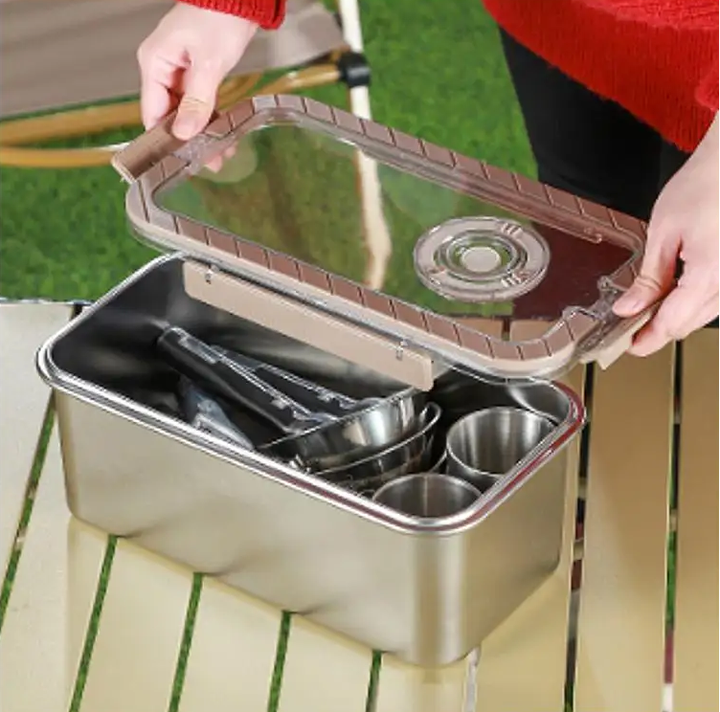 Stainless steel mess kit for camping, featuring durable cutlery and utensils, ideal for outdoor dining and backpacking essentials.