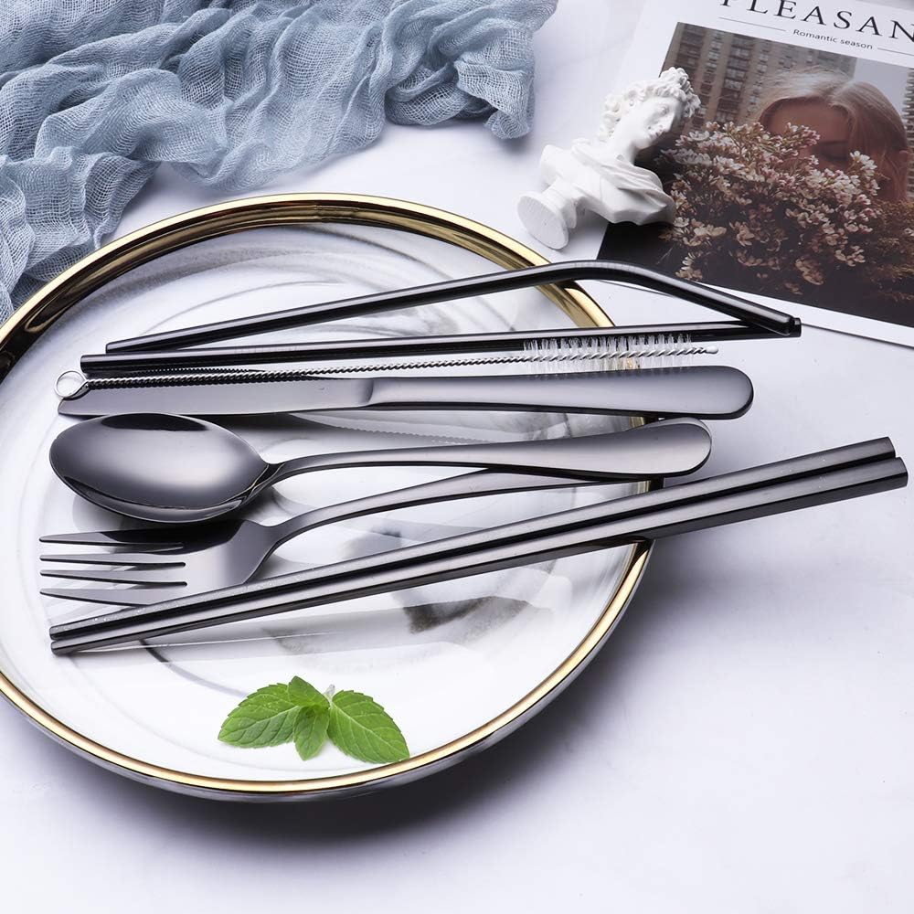Portable stainless steel cutlery set laid out, showing the sleek design of each eco-friendly utensil for travel